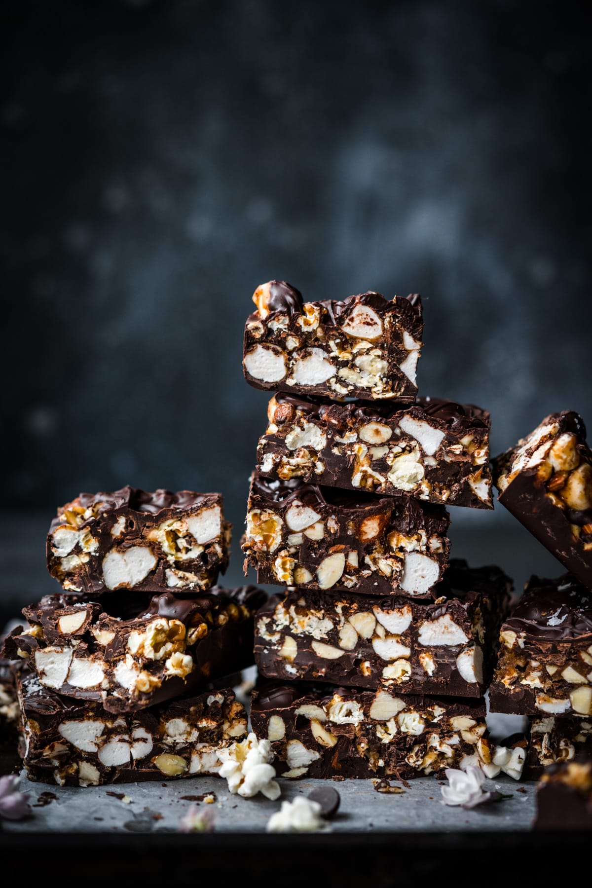 stack of salted caramel popcorn chocolate bars sliced into squares. 