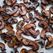 close up view of mushroom bacon on a sheet pan.