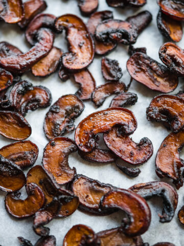 close up view of mushroom bacon on a sheet pan.