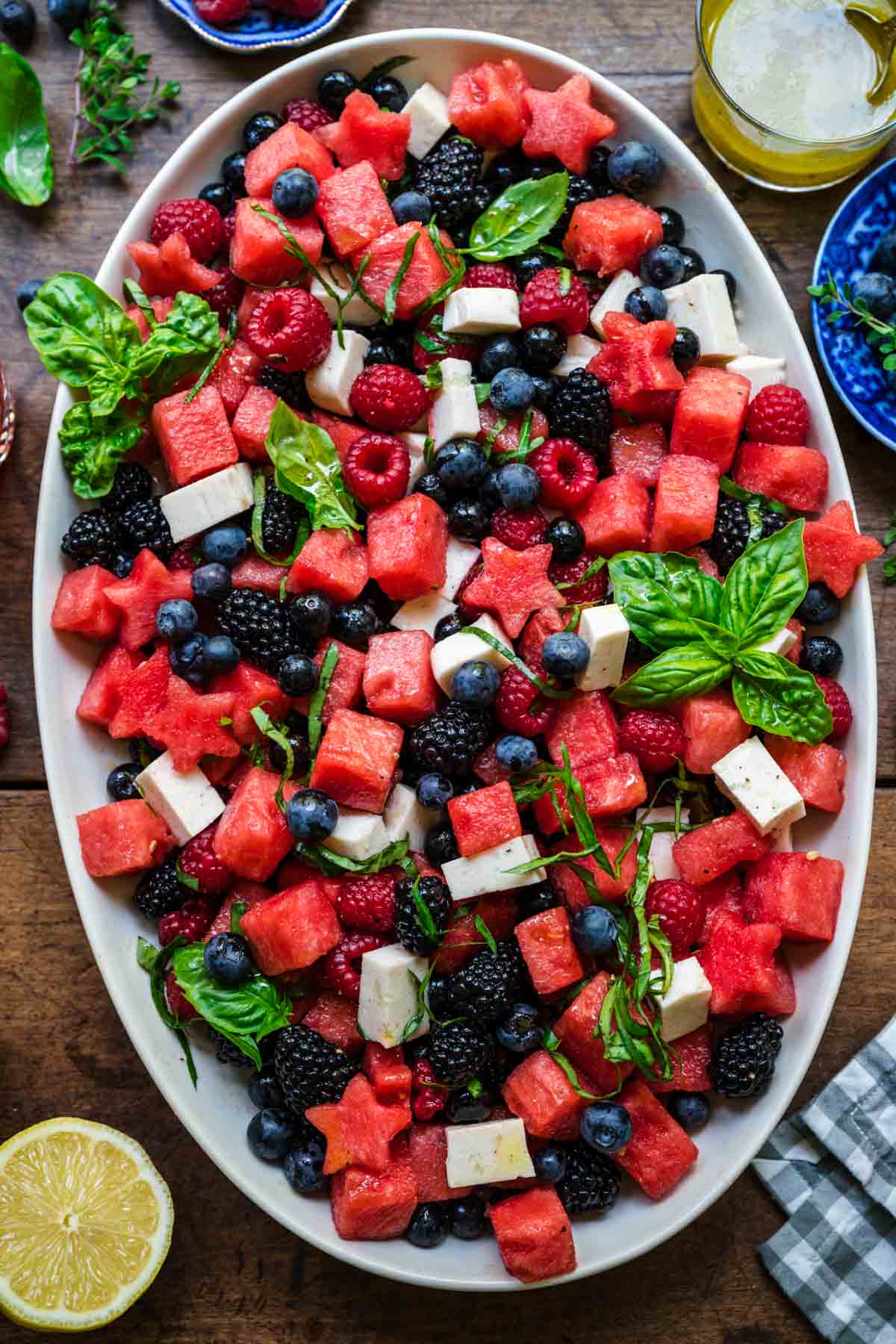 close up overhead view of red white and blue fruit salad on a platter. 