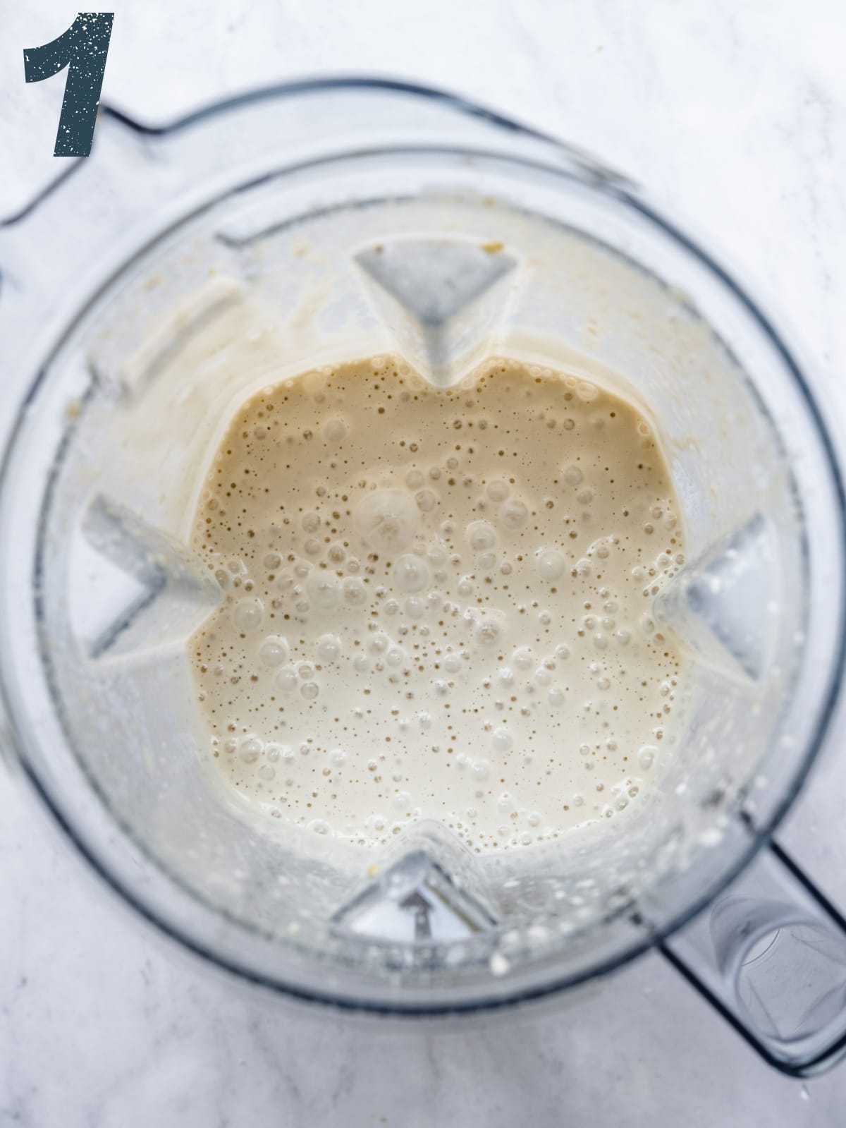 overhead view of vegan ice cream base in blender. 