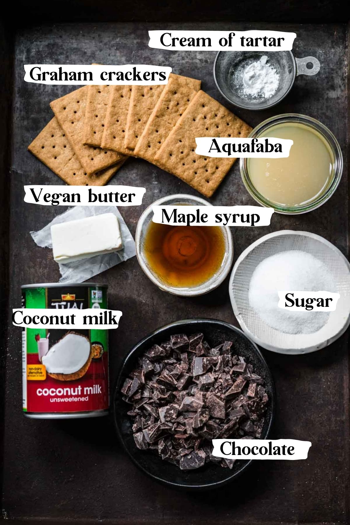 overhead view of ingredients for vegan s'mores tart with text labels. 