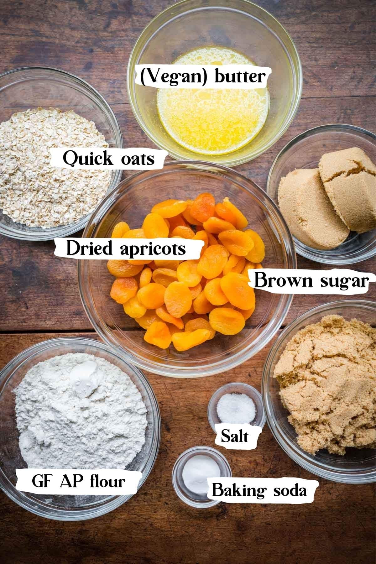 Ingredients you'll need to make the crumble bars, including oats, butter, dried apricots, brown sugar, flour, etc.