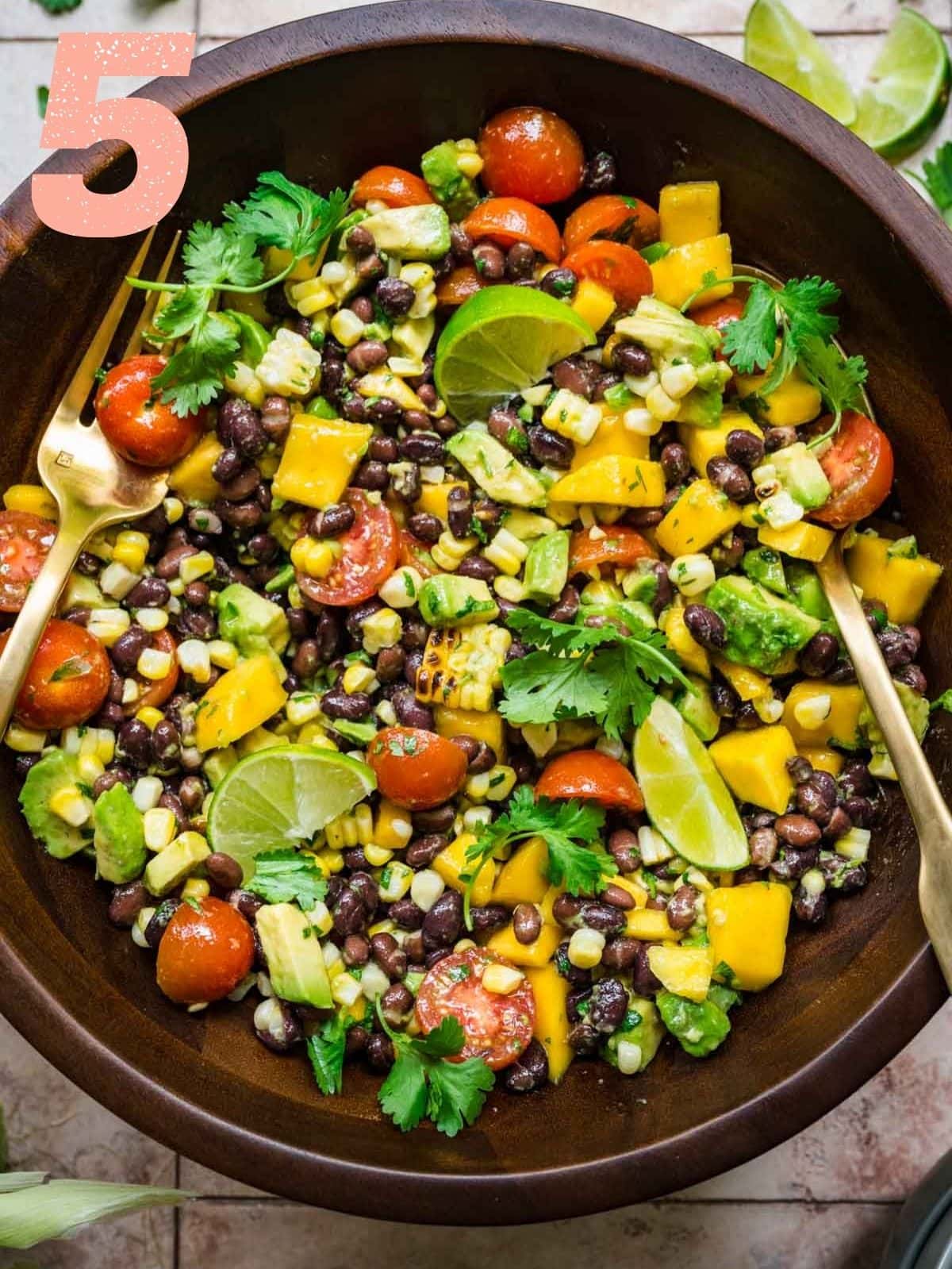 Step five: picture of finished black bean mango salad with dressing.