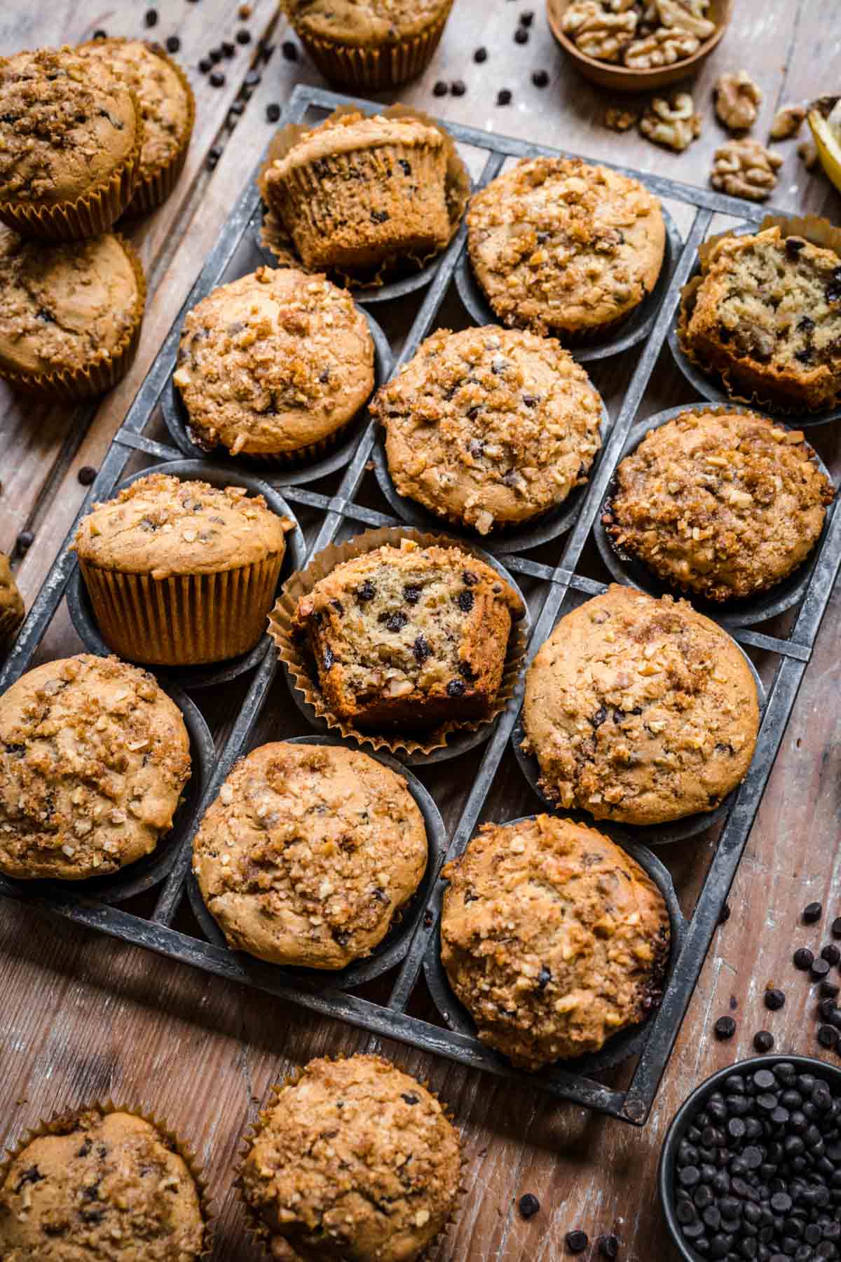 Several banana nut muffins in a muffin tin.