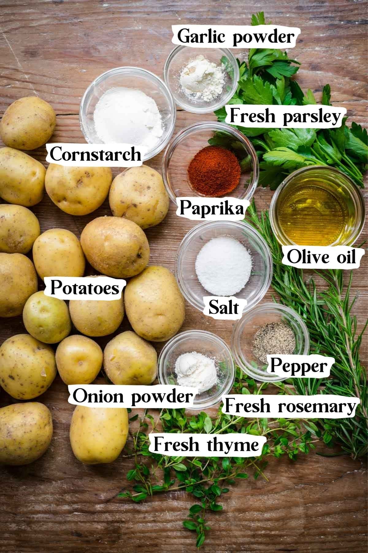 Overhead view of ingredients used in herb roasted potatoes.