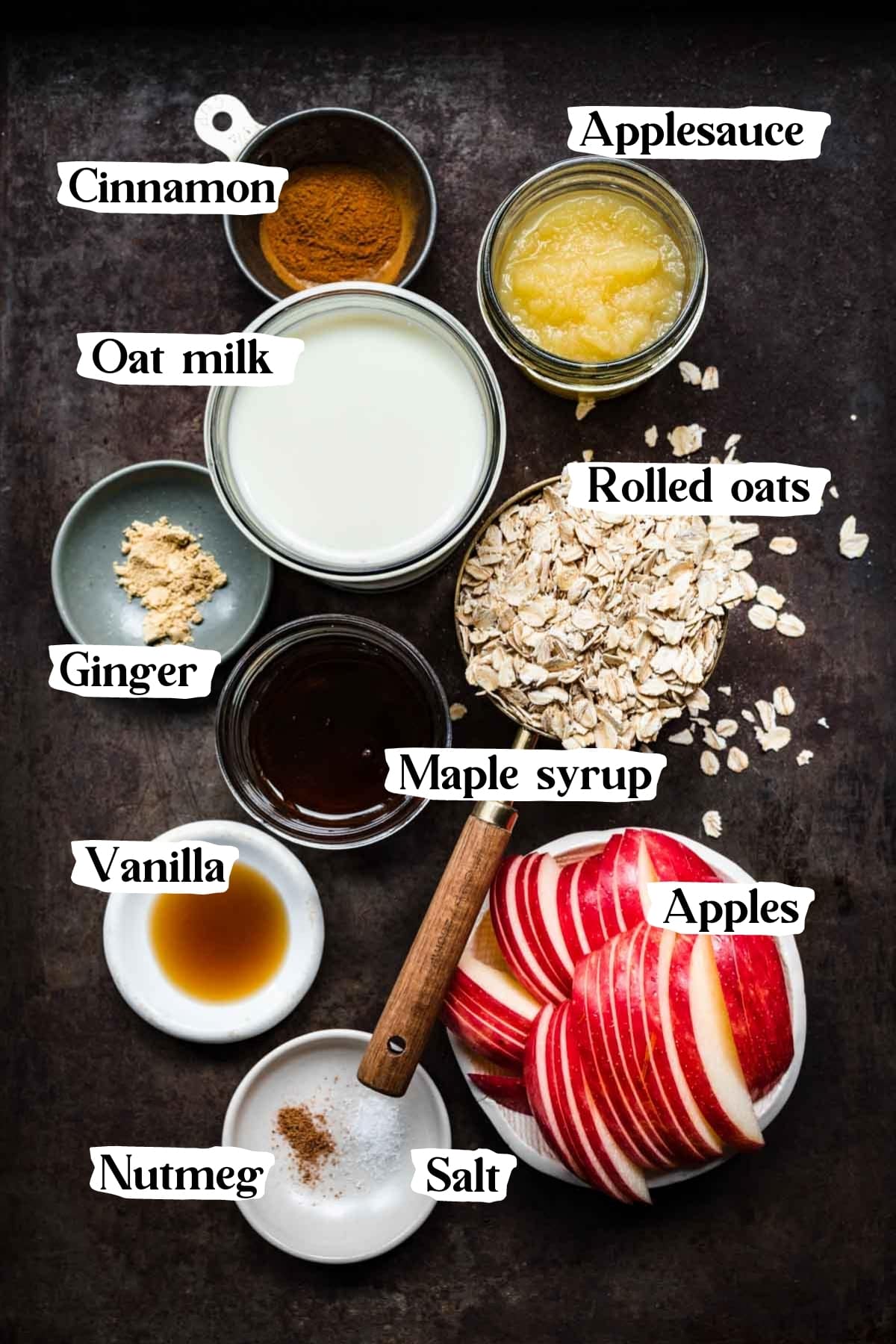 overhead view of ingredients for apple pie overnight oats in small prep bowls. 