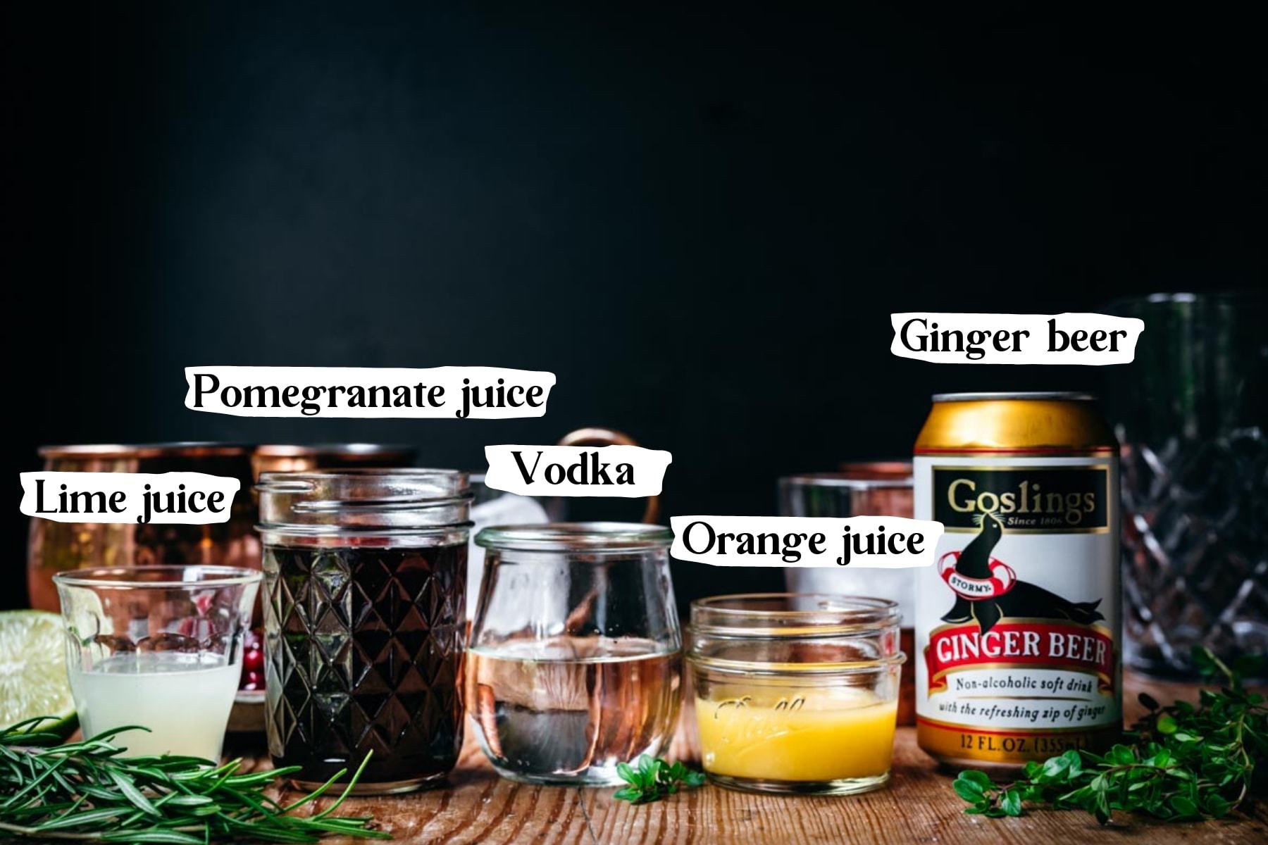 side view of ingredients for pomegranate moscow mule. 