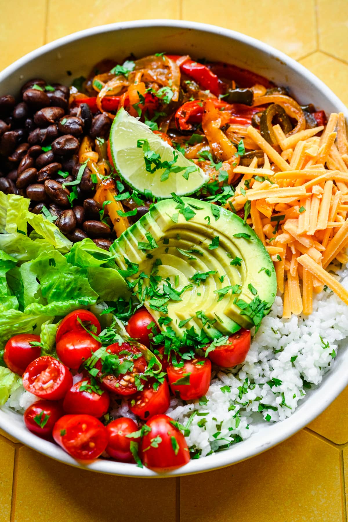 Overhead close up of finished fajita bowls. 