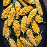 Overhead view of jalapeno poppers on a tray.