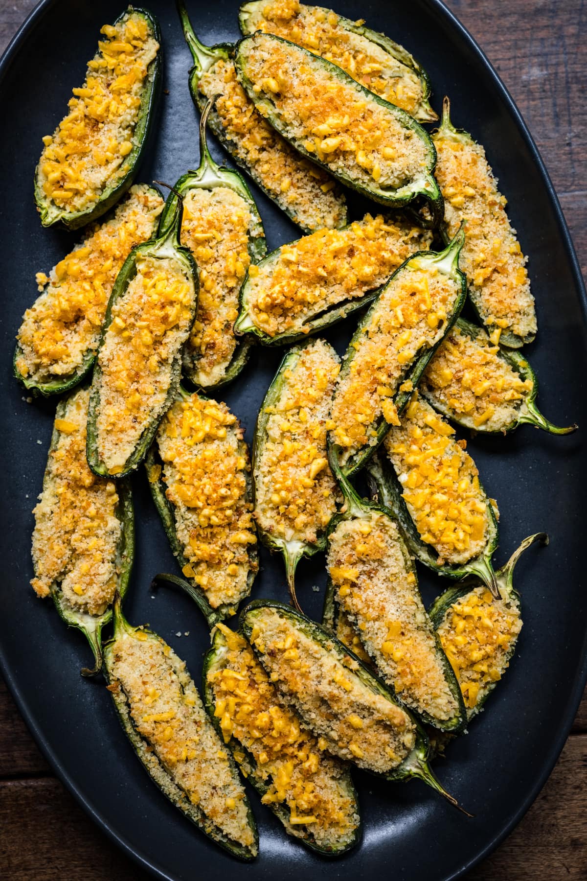 Overhead view of jalapeno poppers on a dish.