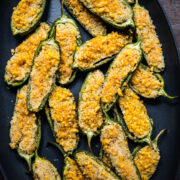 Overhead view of jalapeno poppers on a sheet pan.