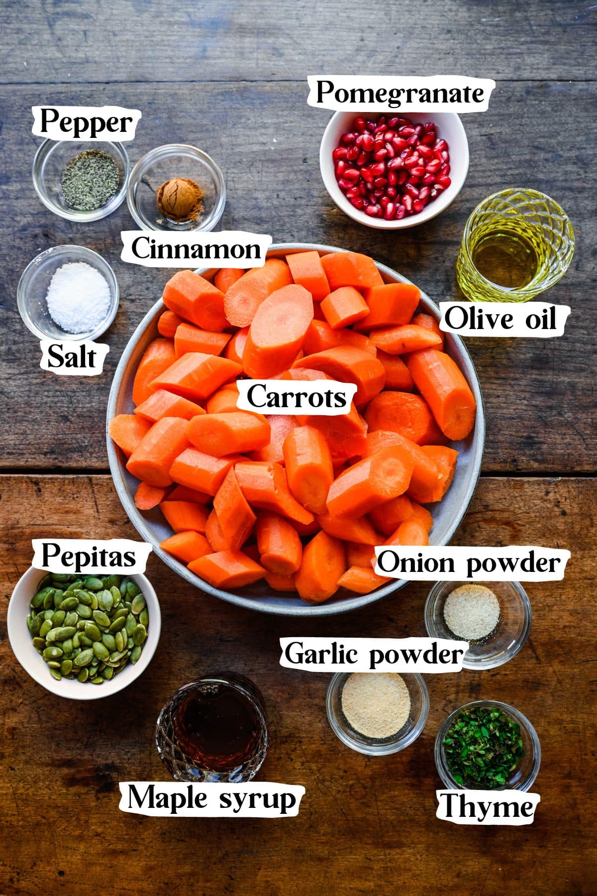 Maple roasted carrot ingredients including pepitas and pomegranate seeds.
