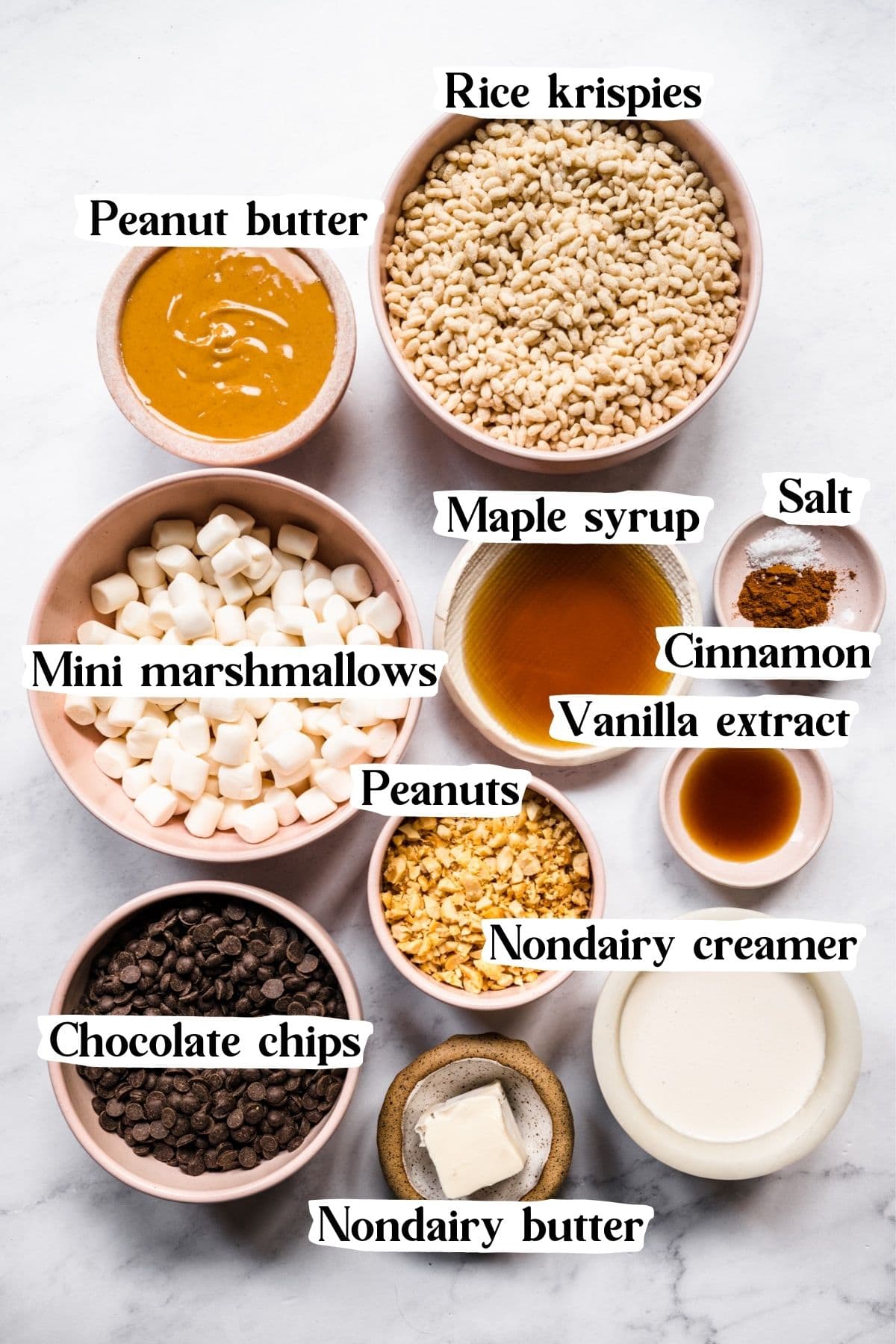 Overhead view of rice krispie ingredients, including chocolate chips and peanuts.