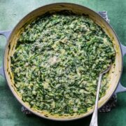 Close up of vegan creamed spinach in a bowl.