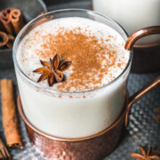 Close up shot of vegan eggnog in a mug.