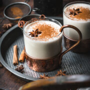 Overhead view of vegan eggnog in a mug.