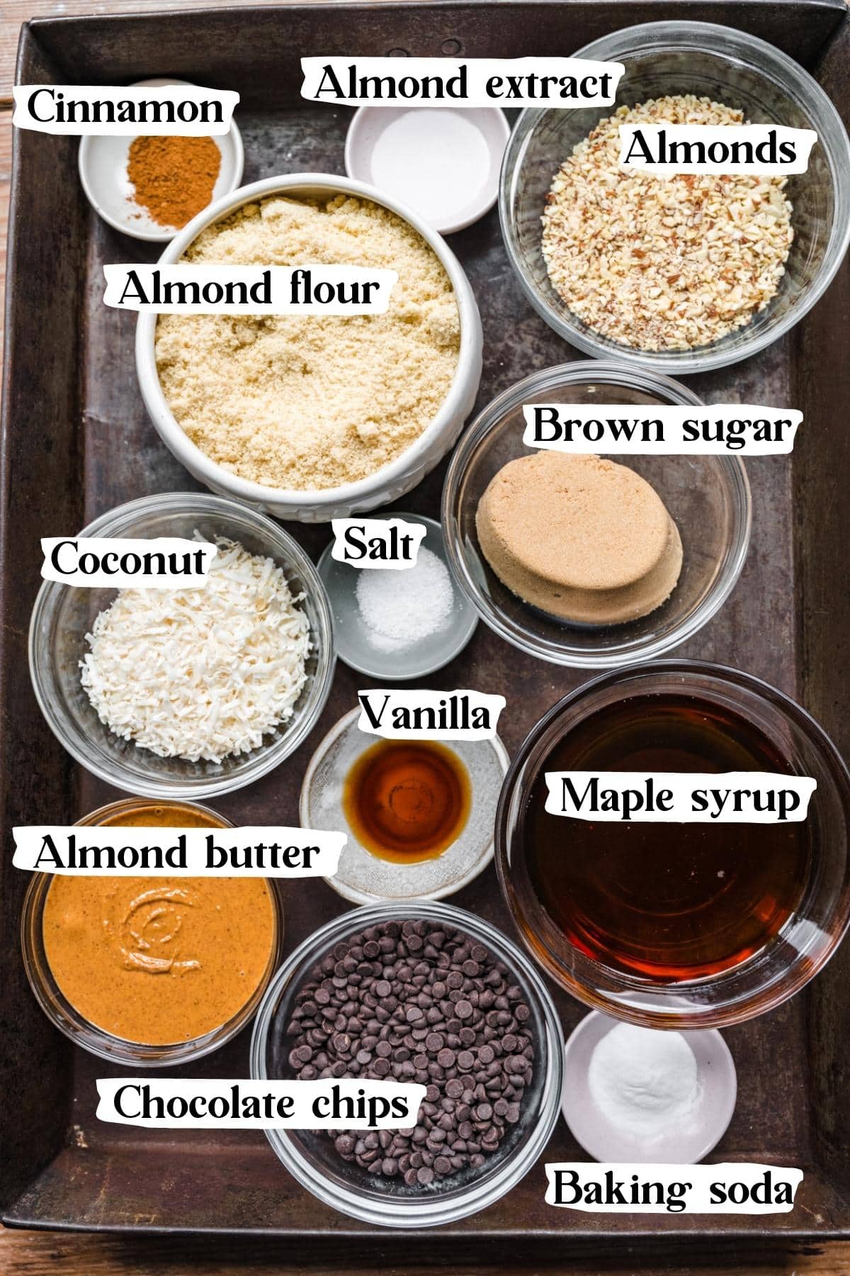 overhead view of ingredients for almond flour cookies in prep bowls. 
