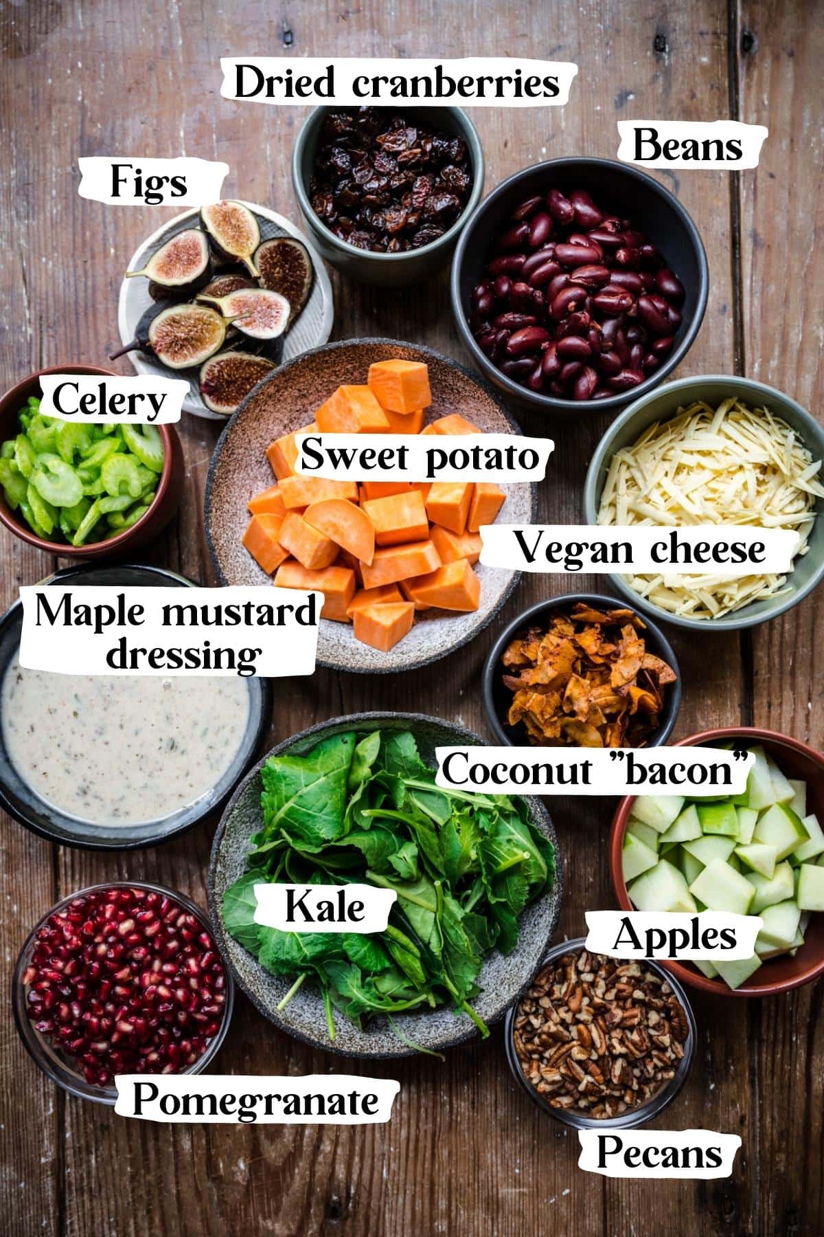 overhead view of ingredients for vegan fall cobb salad in small prep bowls. 