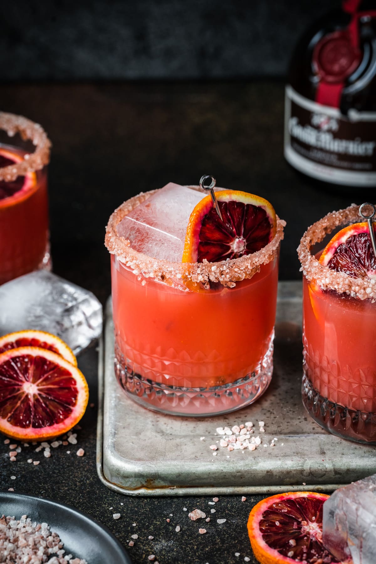 Front view of grand marnier margarita garnished with a blood orange slice.