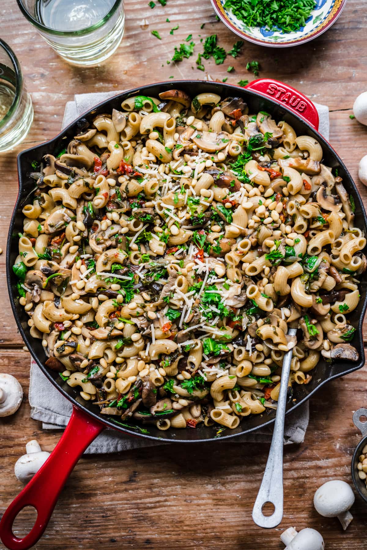 Overhead view of mushroom pasta in a cast iron pan.