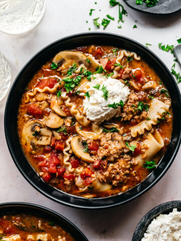 Overhead view of vegan lasagna soup in a bowl.