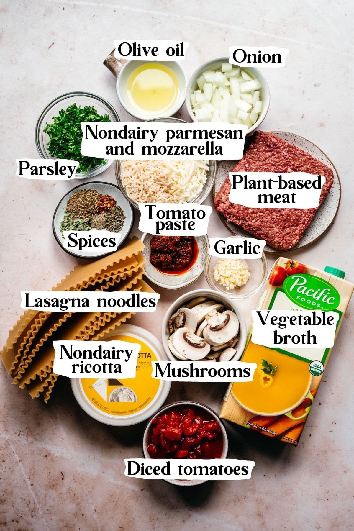 Overhead view of lasagna soup ingredients, including vegetable broth and plant-based meat.