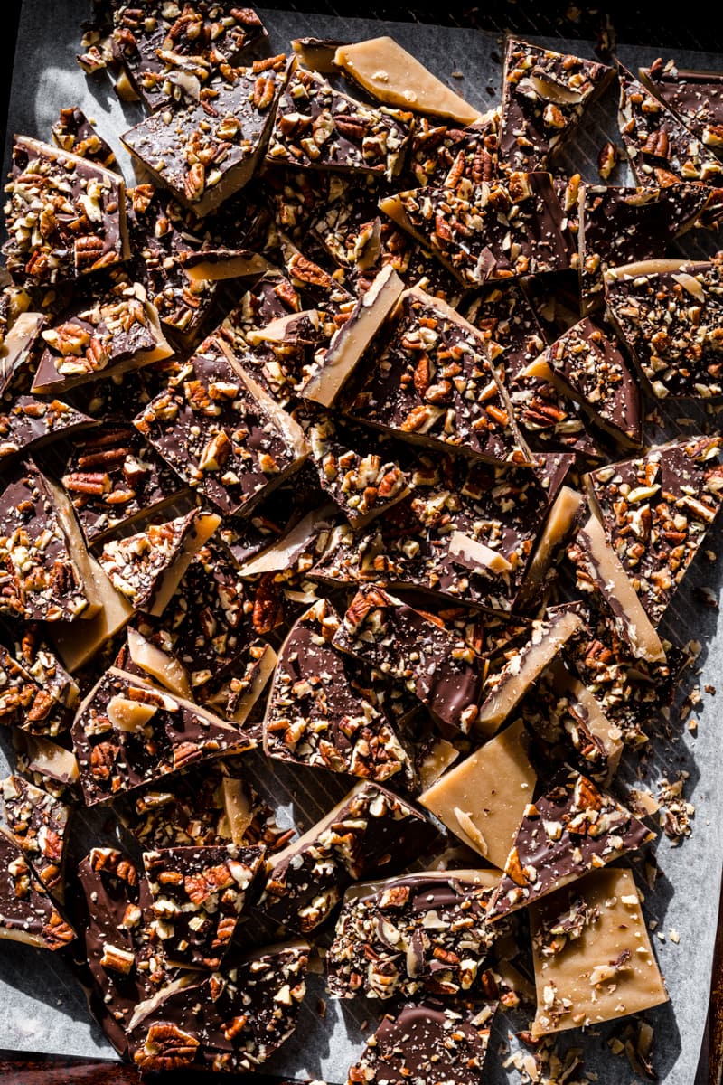 overhead view of vegan toffee on a sheet pan. 