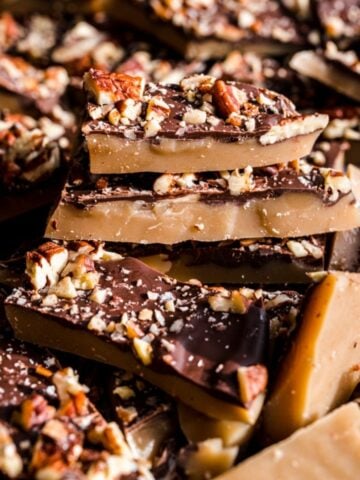 Front view of several pieces of broken up vegan toffee.