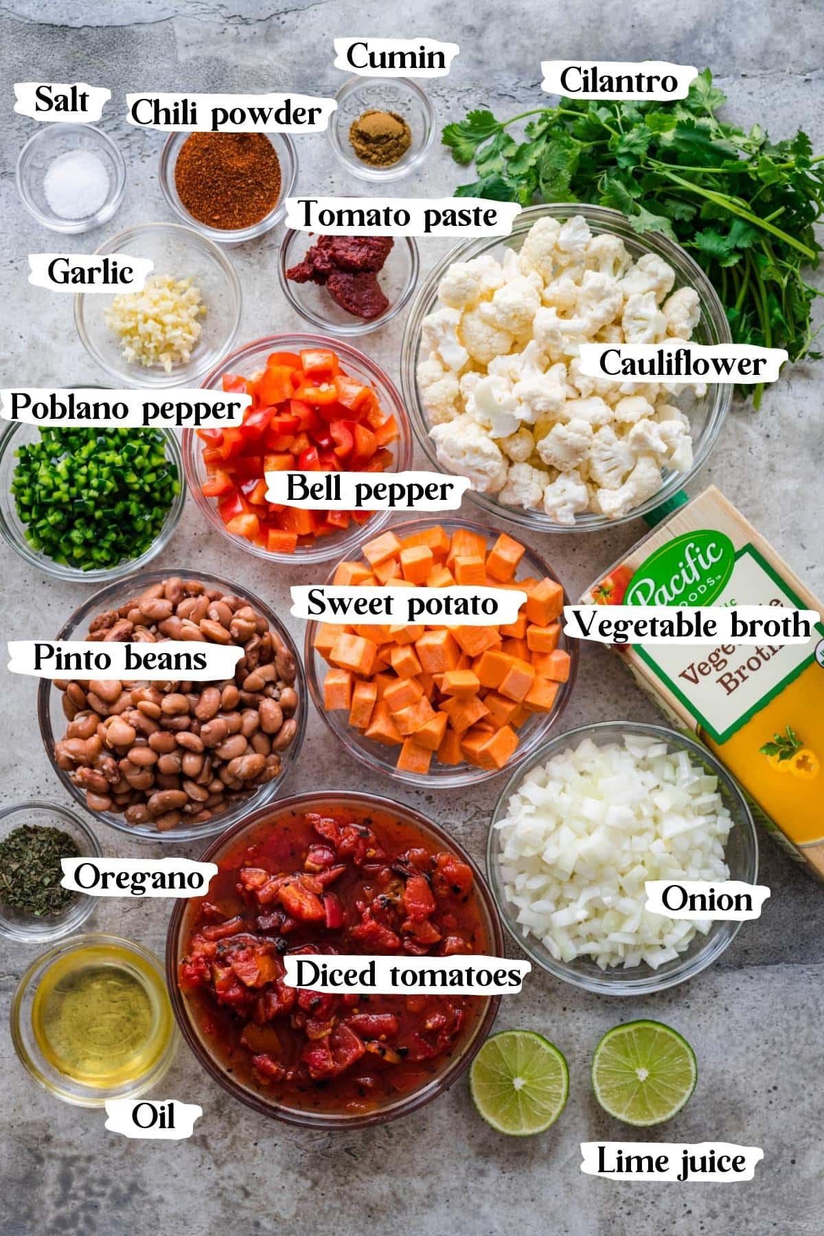 overhead view of ingredients for cauliflower chili in small prep bowls. 