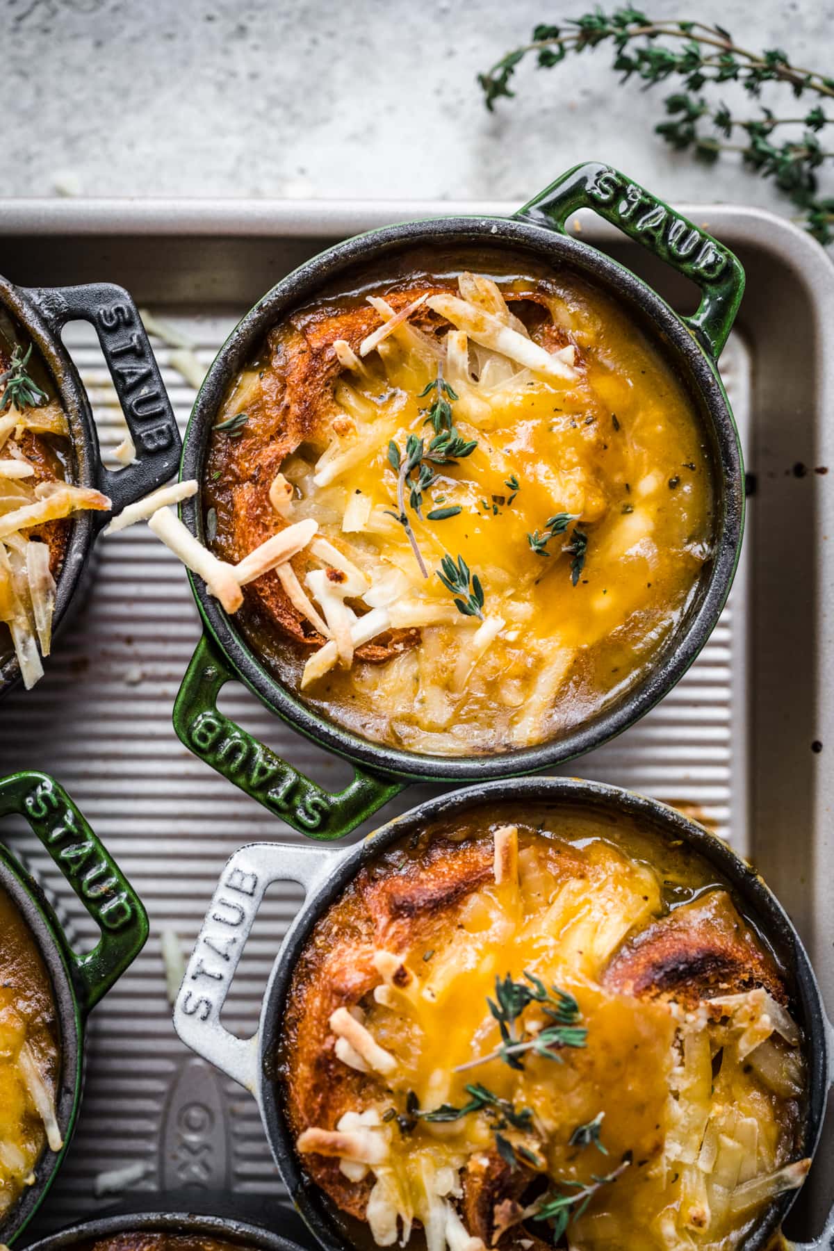 Close up view of Staub cocotte with. melted cheese top.