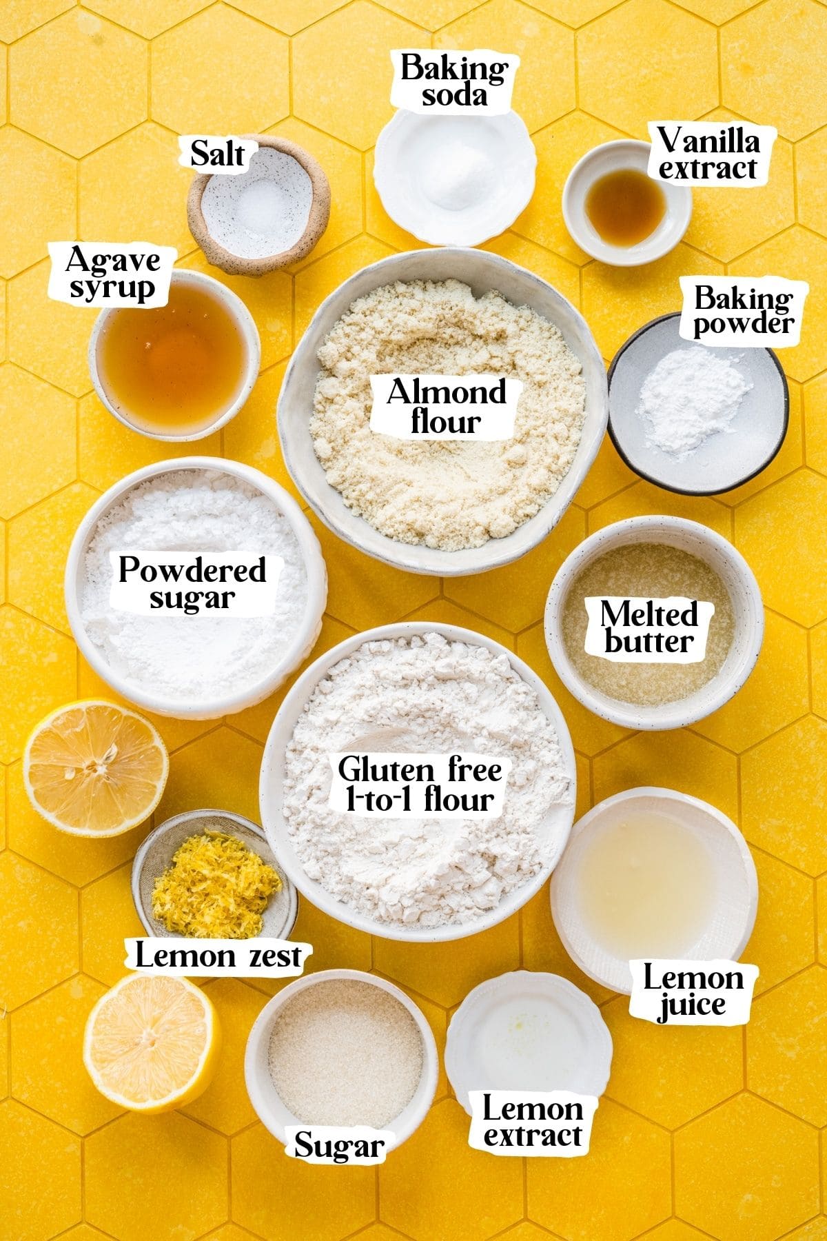 Overhead view of lemon cookie ingredients, including almond flour, lemon zest, and sugar.
