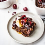 Overhead view of chocolate cherry oats on a plate.