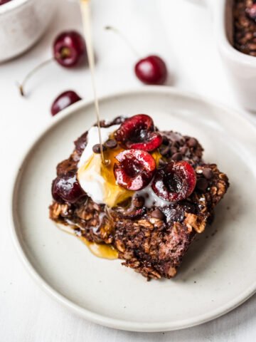 Overhead view of chocolate cherry oats on a plate.