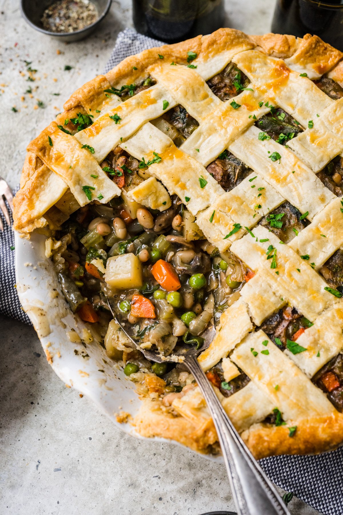 Overhead view of pot pie with a scoop taken out of it.