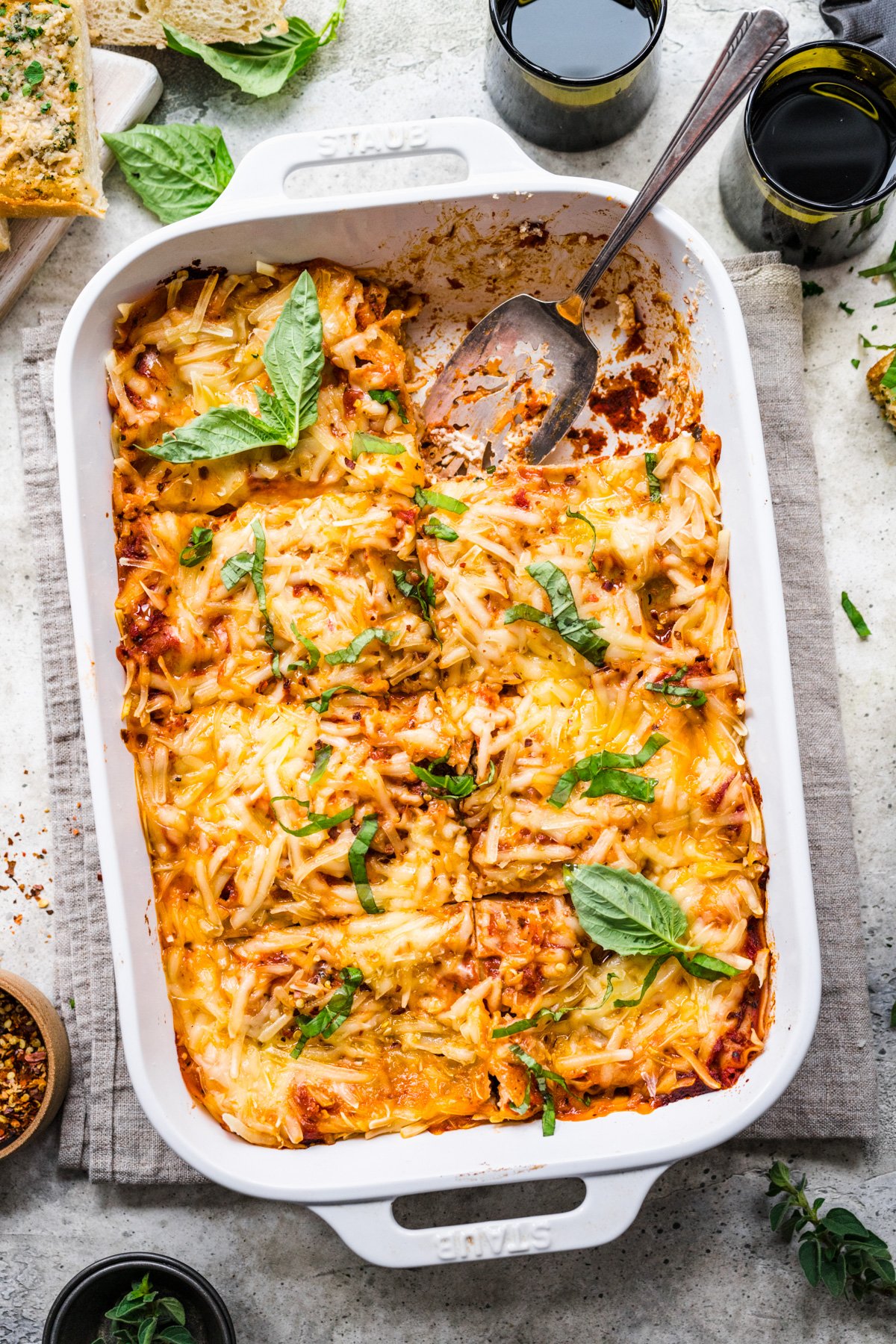 Overhead view of vegan lasagna in a tray.