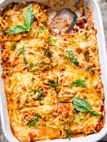 Overhead view of vegan lasagna in a tray.