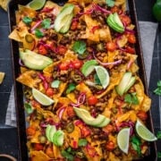 Overhead view of nachos on a tray.