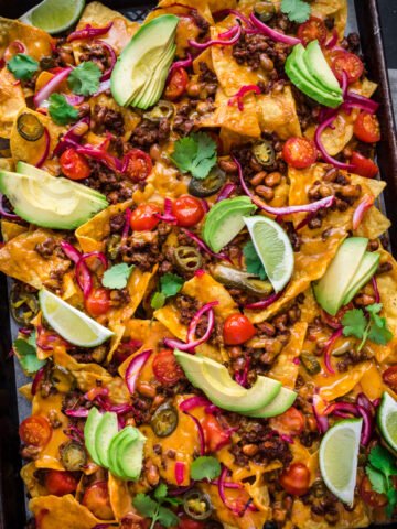 Overhead view of nachos on a tray.