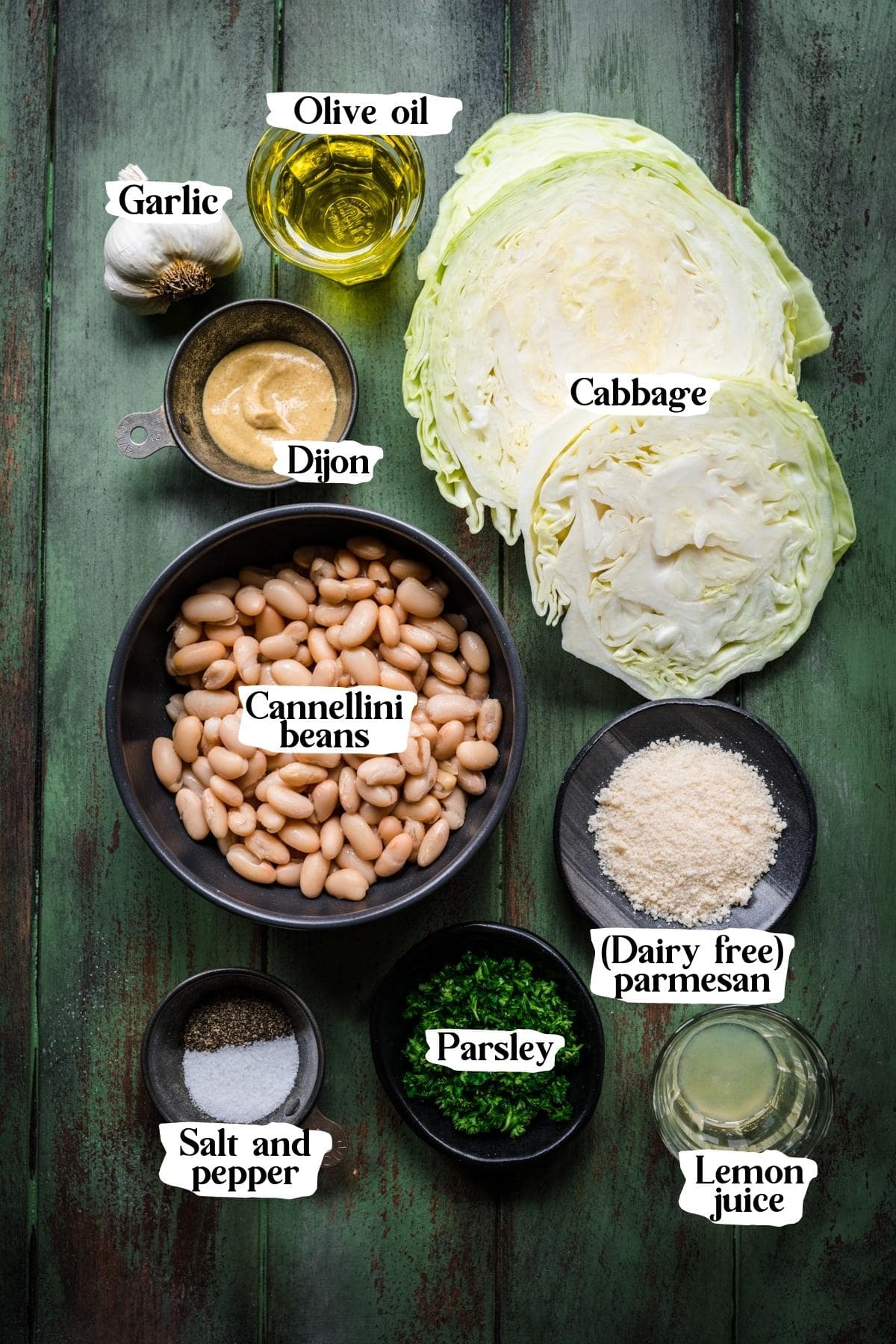 Overhead view of cabbage steak ingredients, including cabbage and olive oil.