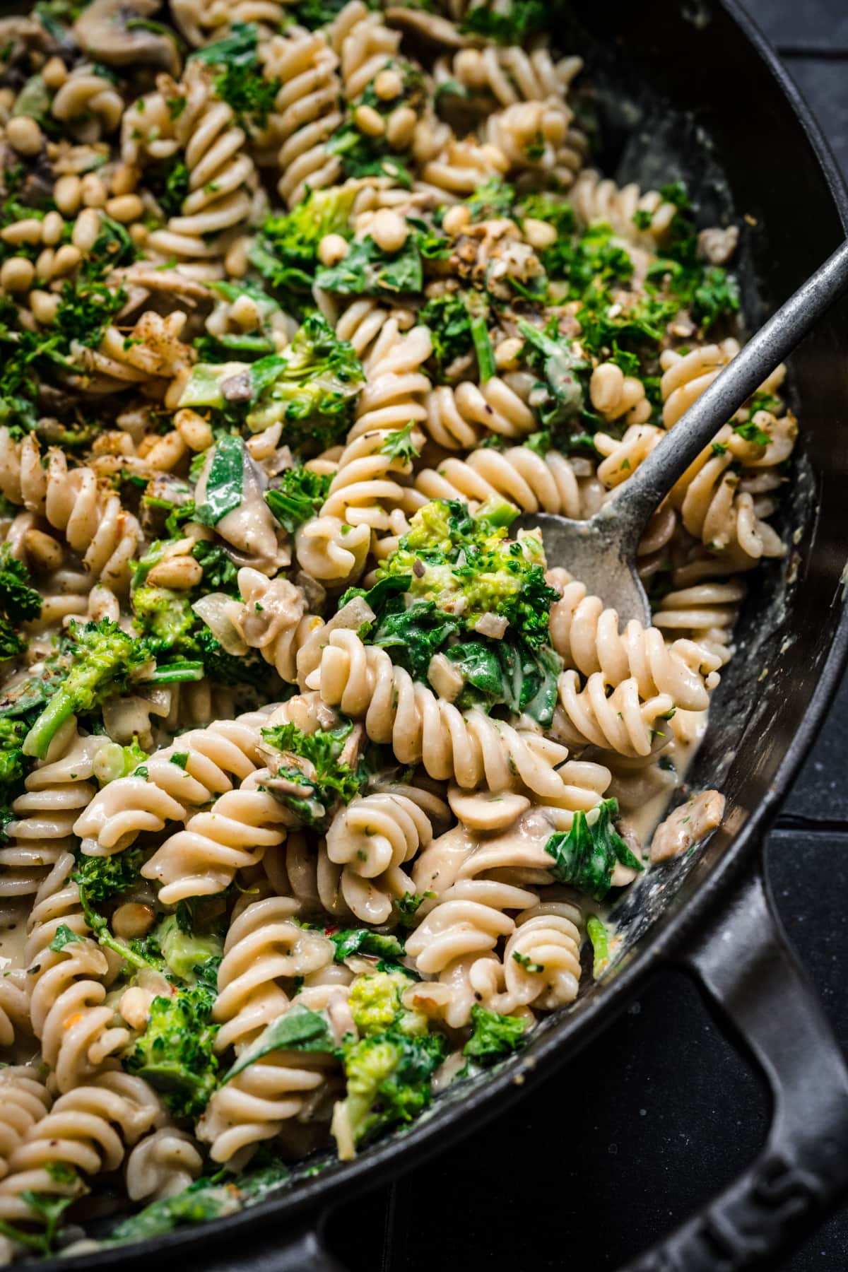 Close up view of hummus pasta in a pan.