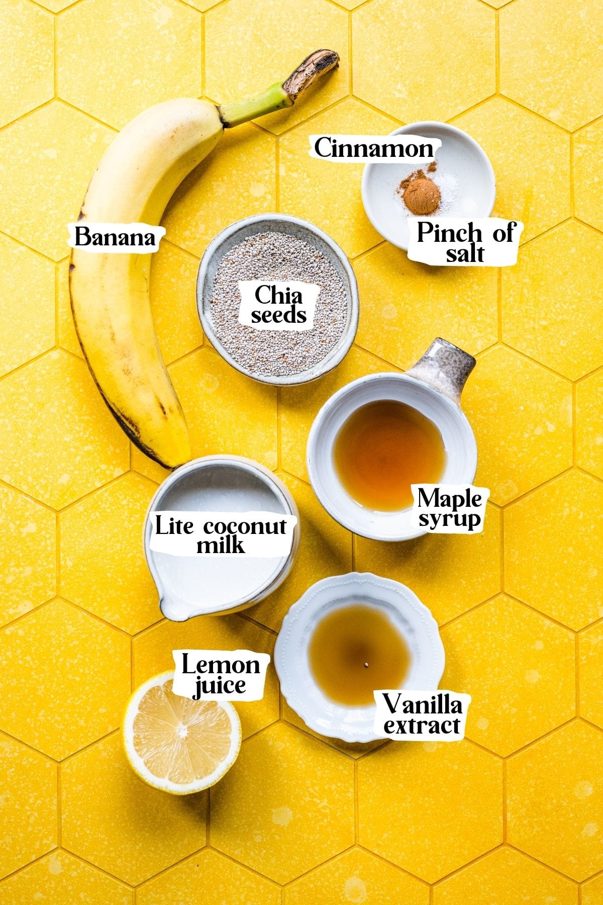 Overhead view of banana chia pudding ingredients, including chia seeds and a banana.
