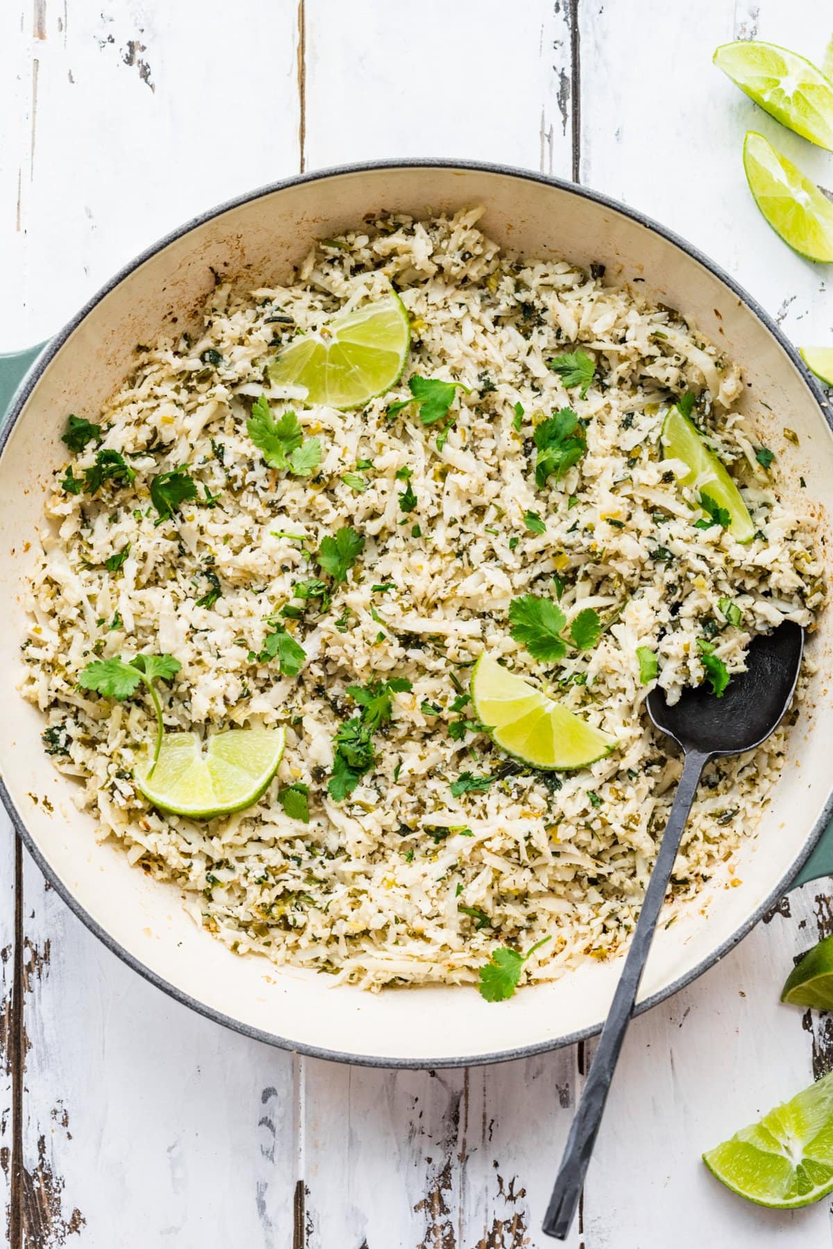 Overhead view of cilantro lime cauliflower rice in a pan.