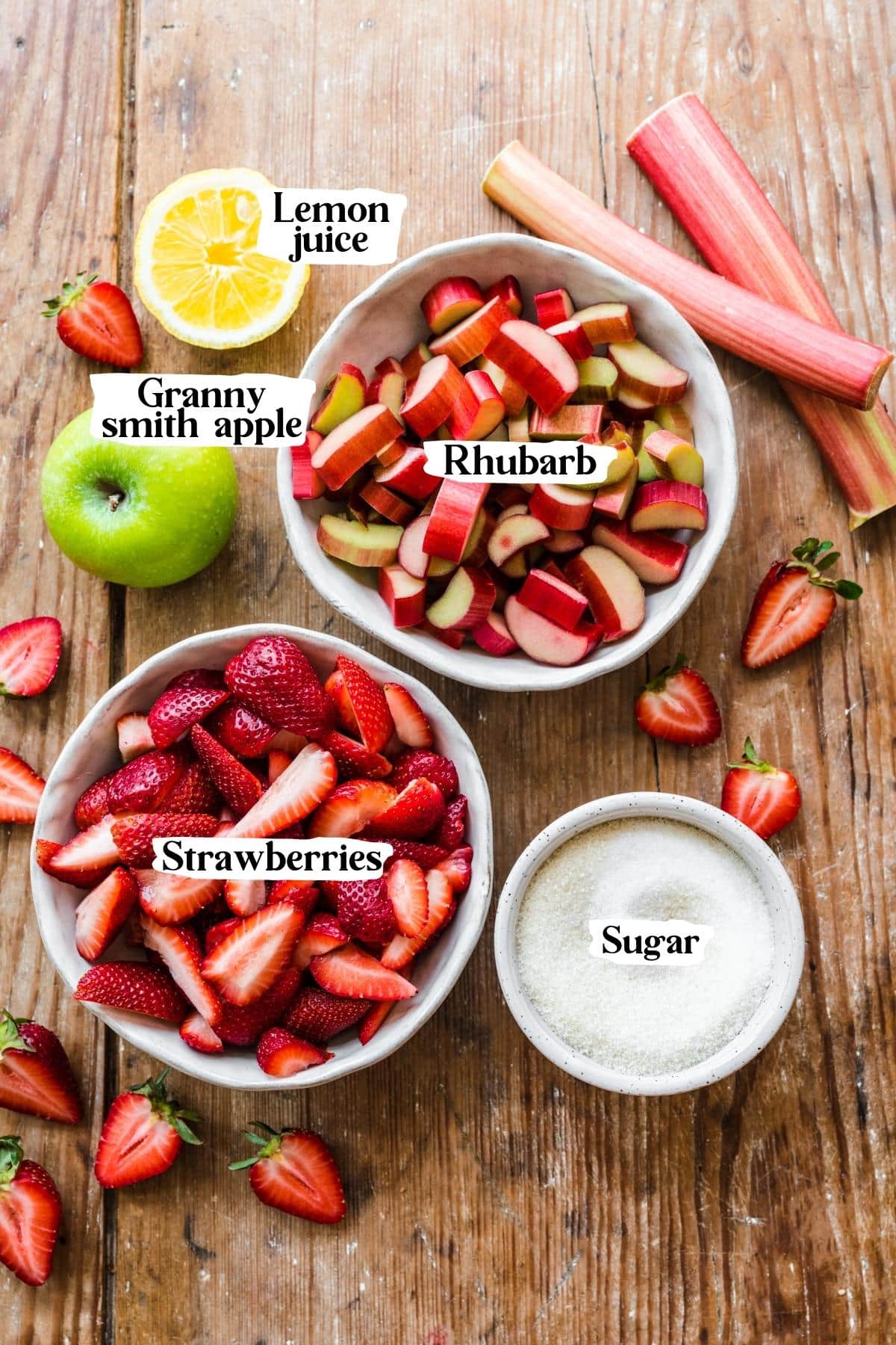 Overhead view of strawberry rhubarb jam ingredients.