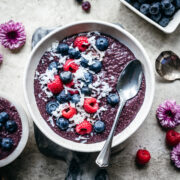 Overhead view of blueberry chia pudding with fruit on top.