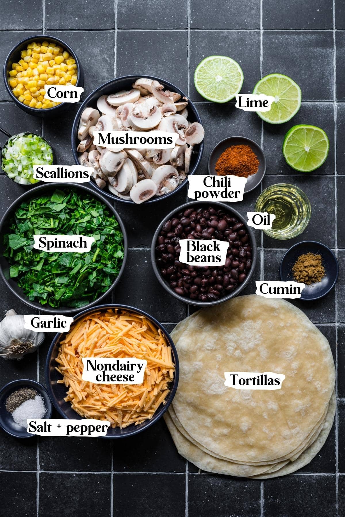Overhead view of vegan quesadilla ingredients, including mushrooms and black beans.