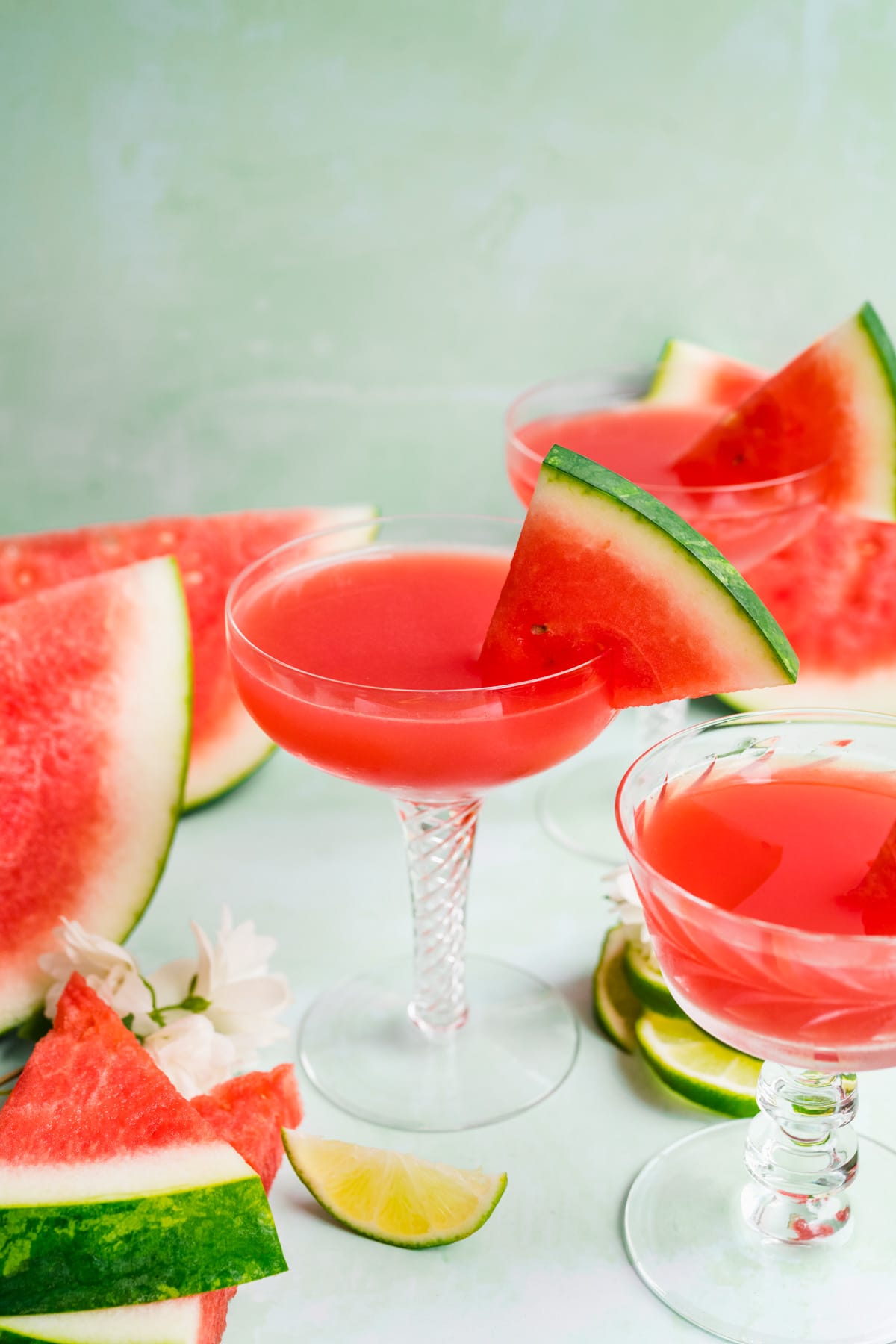 Finished watermelon martinis with watermelon garnish.