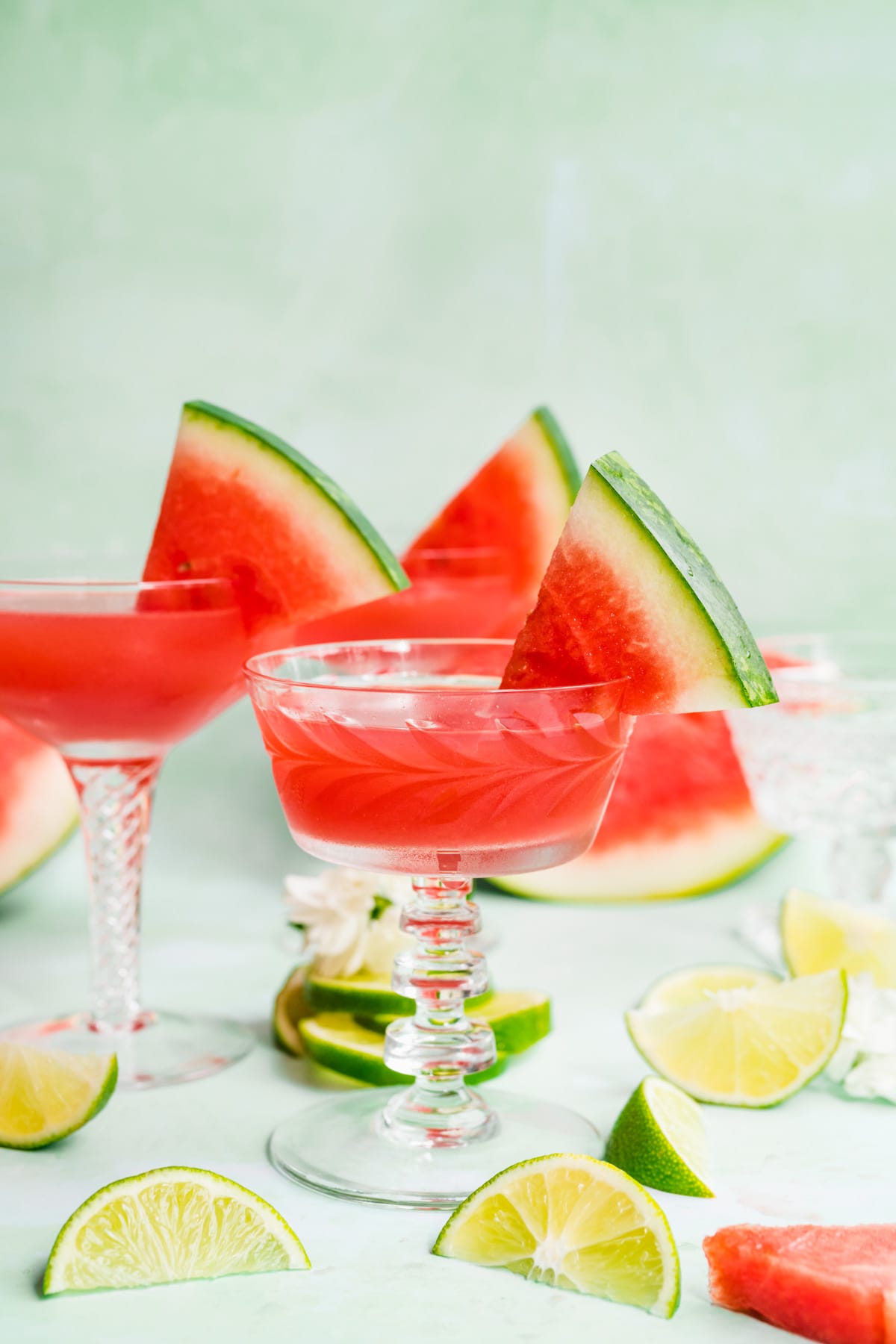 Front view of finished watermelon martinis in glasses.