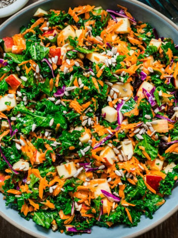 Overhead view of kale apple slaw in a bowl.