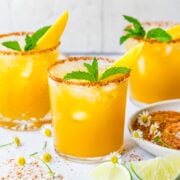 Close up view of finished mango margaritas.